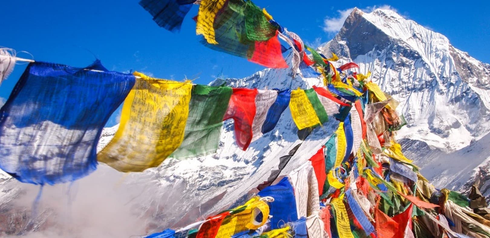 Buddhist Prayer Flags fluttering in annapurna