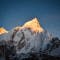 Sun kisses the majestic peaks of Mount Everest